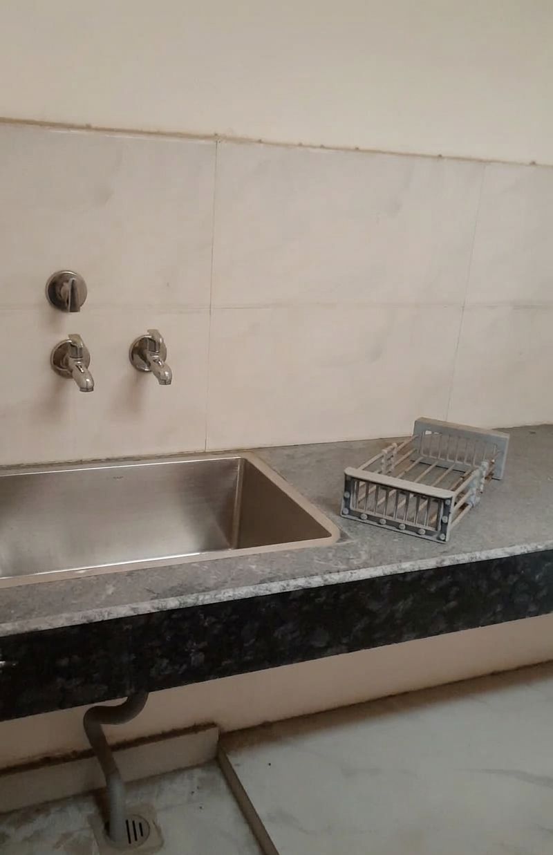 Pantry area with granite countertop in commercial property Panipat