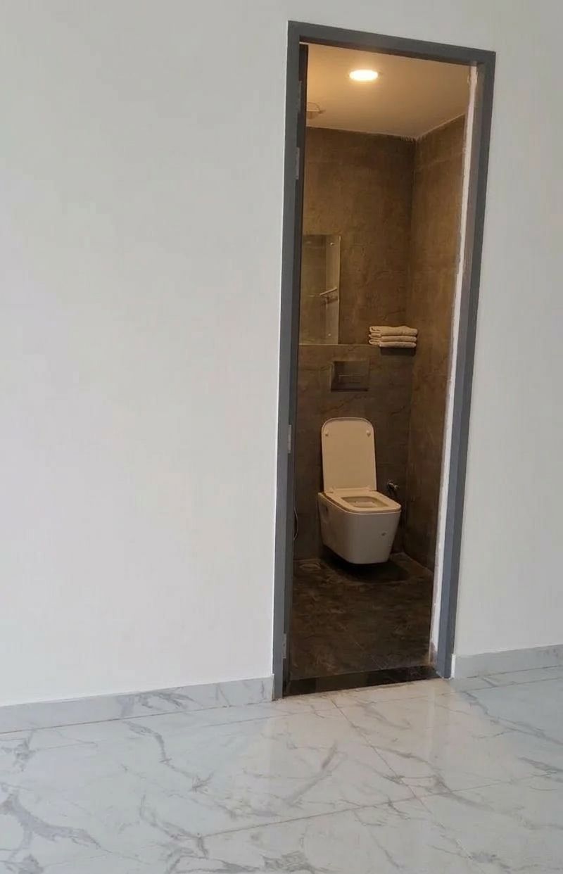 Modern washroom facilities in commercial showroom Panipat